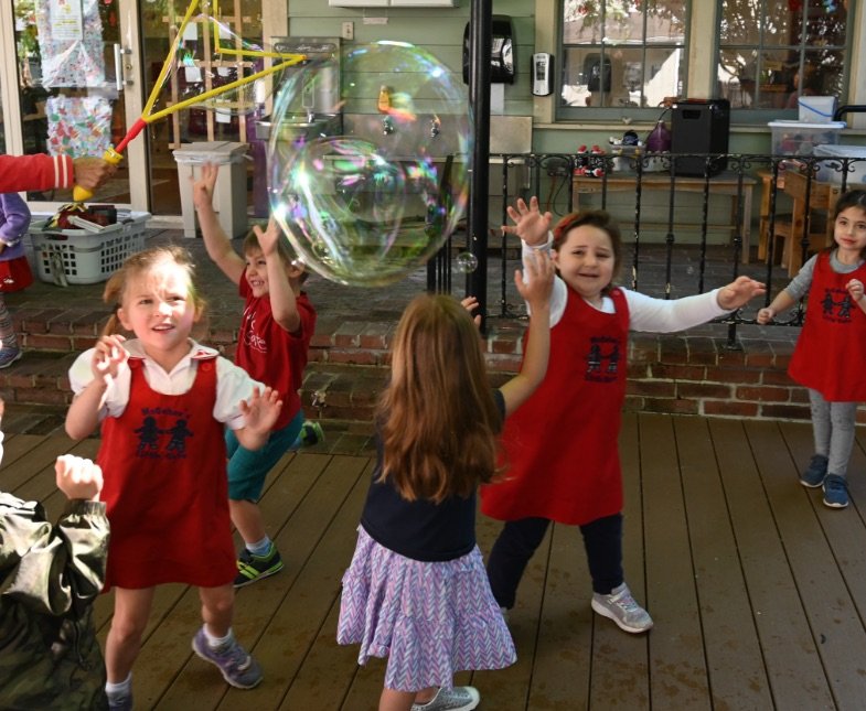 LG students playing with bubbles